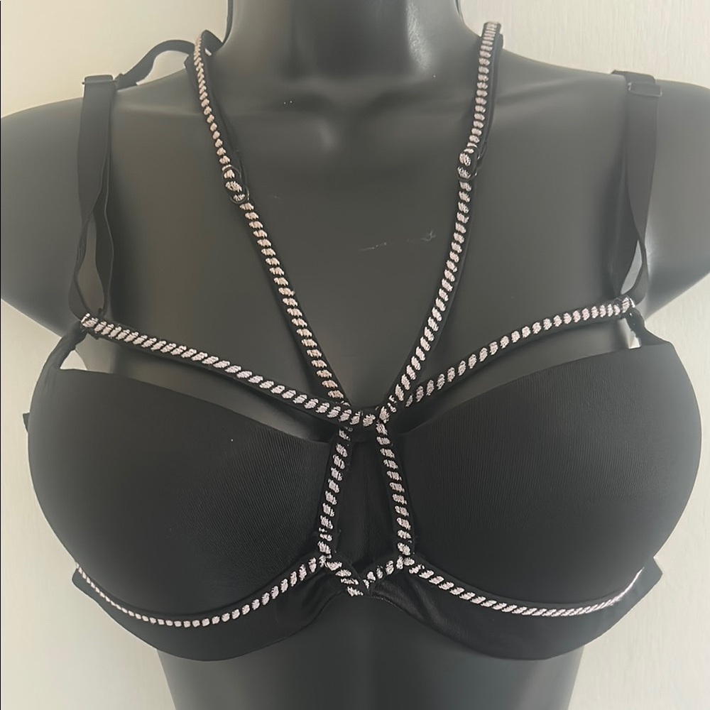 Beautiful/Sexy NWOT Black Strappy Bra with Silver strap accents. Accents